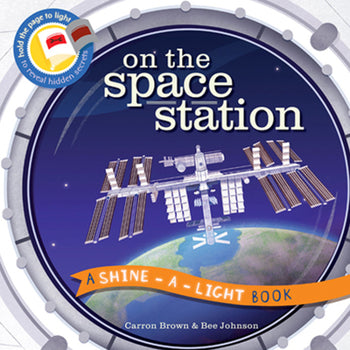 On the Space Station (Part of the Shine-a-Light Books Series) By Carron Brown